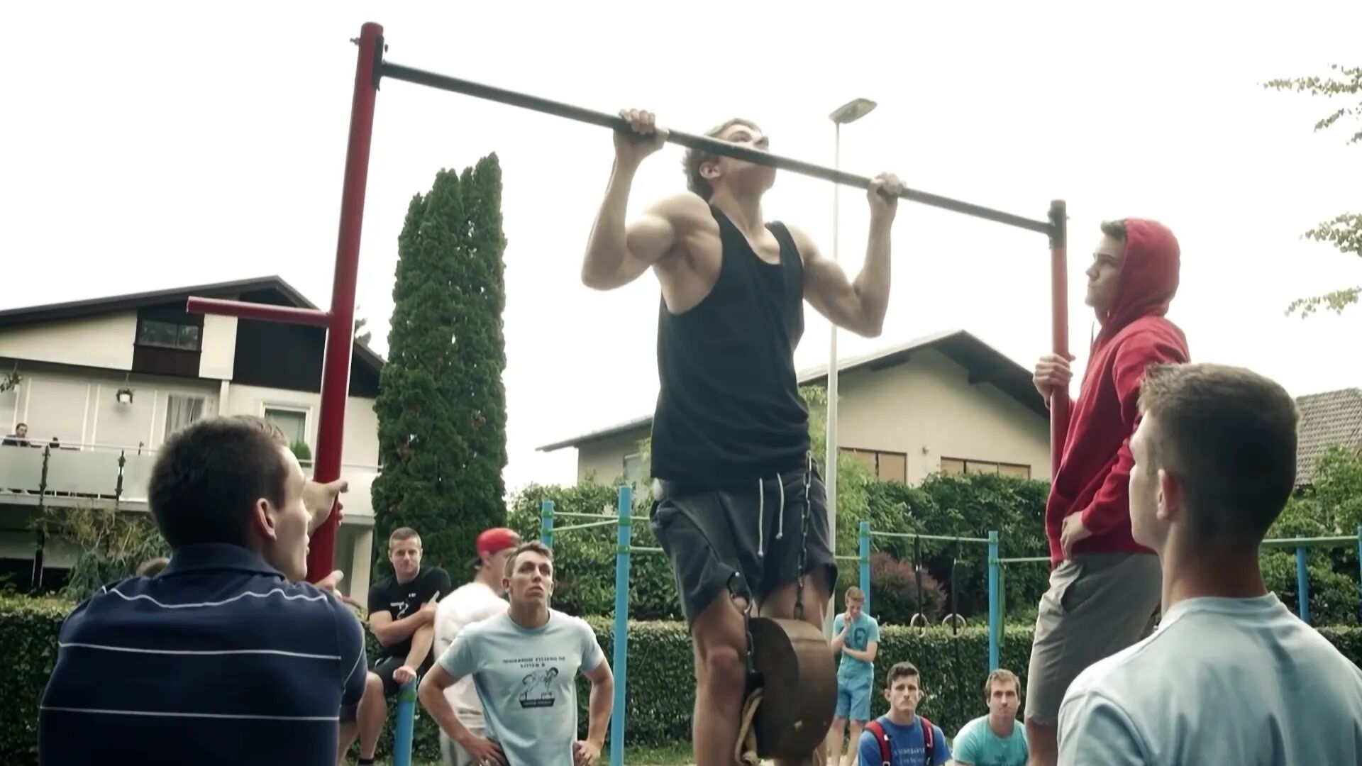 Group participating in a Calisthenics Ireland bodyweight training workshop, learning proper form and progression techniques