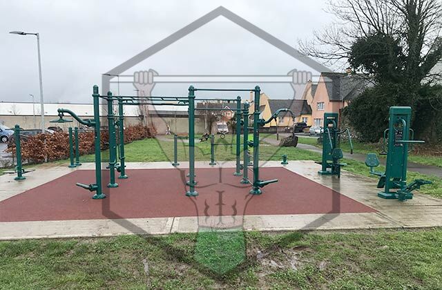 Outdoor training equipment at Dungarvan Calisthenics Park in Waterford, including bars for pull-ups, core exercises, and street workout