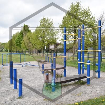 Outdoor calisthenics training area at Gaels Drumfinn Park in Dublin, equipped with bars and fitness structures for public bodyweight workouts