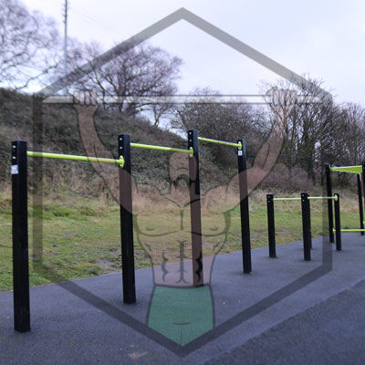 Outdoor calisthenics exercise equipment at Liffey Valley Park in Dublin, designed for public bodyweight and functional fitness training