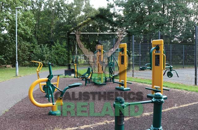 Outdoor workout gym at Mount Bernard Park in Dublin, featuring calisthenics equipment for bodyweight training and functional fitness