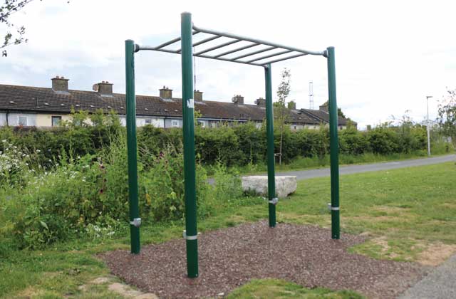 Outdoor calisthenics park at Royal Canal Greenway in Dublin, equipped with pull-up bars and parallel bars along the canal walkway